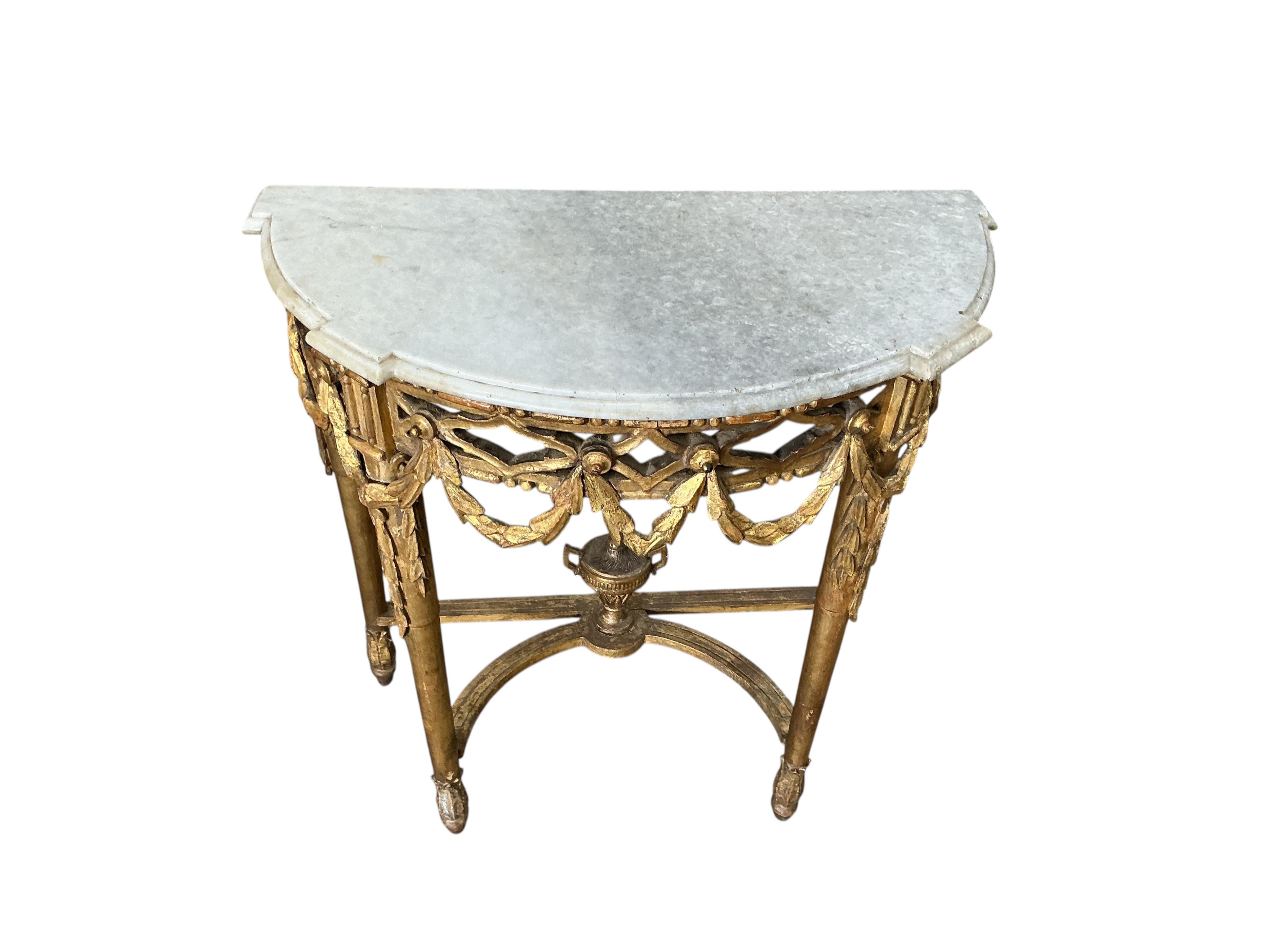 A 19th century Louis XVI style giltwood demi lune table with white marble top, width 82cm, depth 42cm, height 84cm
